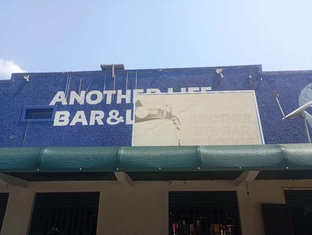 Another Bar and Lodge, Mugisha Andrew, Cahsier in Kasese
